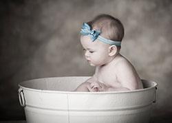 Tuscaloosa photographer picture of a baby in a wash tub. 