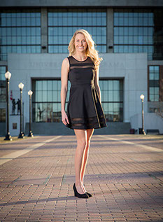 University of Alabama senior portrait at Byant Denny Stadium walk of fame. Graduation pictures by a Tuscaloosa photographer.