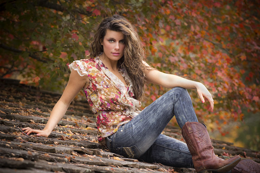 Senior Portrait taken at North River Yatch Club in Tuscaloosa, Alabama. Fall colors make this picture different. 