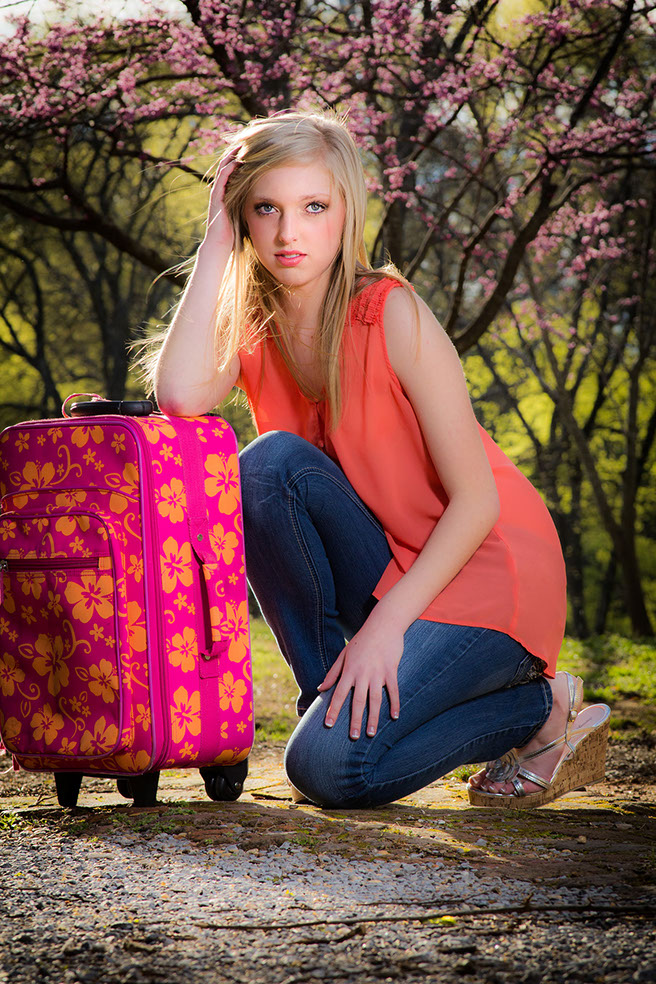 Unique senior portrait at Capitol Park in Tuscaloosa, Alabama with spring colors.